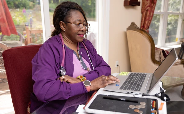 nursing student working in home